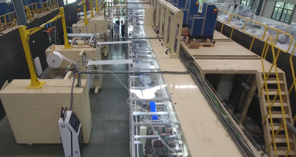 Full Servo 85% Efficiency 700pcs/Min Baby Diaper Production Line