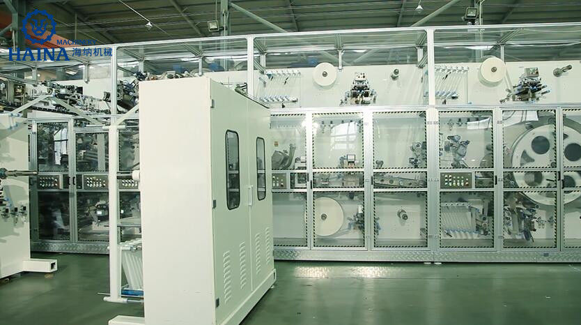 HAINA 250KW 97% Passing T Shape Elastic Ear Diaper Manufacturing Machine